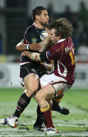 Luke McAlister is smashed by Matt Saunders during the round seven ITM Cup match between Southland and North Harbour, Rugby Park, Invercargill, New Zealand, September 10, 2010