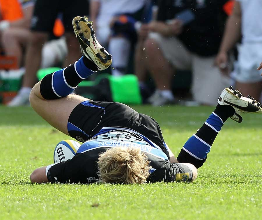 Bath's Nick Abendanon feels the force of a tackle