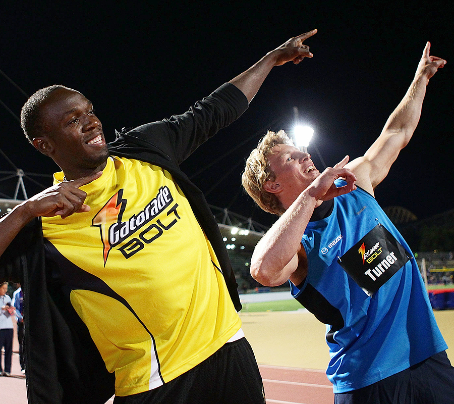 Wallabies wing Lachie Turner poses with Usain Bolt