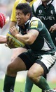 London Irish's Elvis Seveali'i is tackled by the Saracens defence