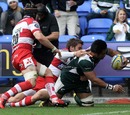 London Irish No.8 George Stowers reaches out to score