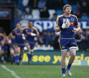 Otago flanker Adam Thomson leads out the team