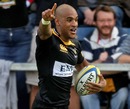 Wasps wing Tom Varndell runs in an early try