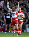 Gloucester fly-half Nicky Robinson celebrates his game-winning penalty