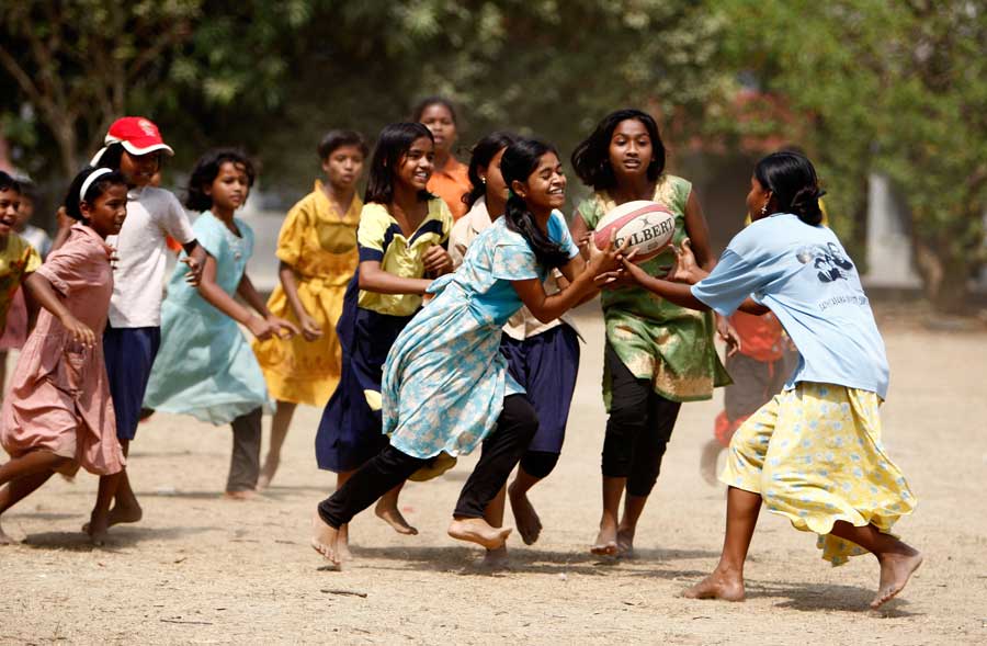 Girls playing rugby at an orphanage outside Kolkata in a game organised by England-based charity Rugby Uncle
