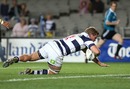 Auckland flanker Daniel Braid dives over to score