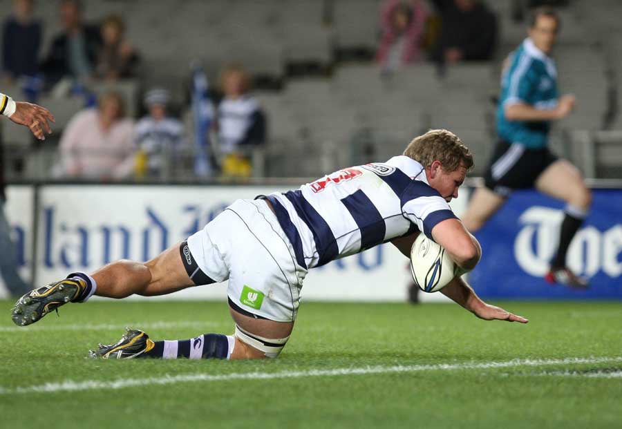 Auckland flanker Daniel Braid dives over to score