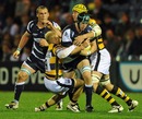 Sale's James Gaskell is engulfed by the Wasps defence