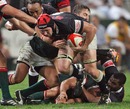 The Sharks' Jacques Botes forces an opening
