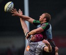 Quins' Chris Robshaw and Newcastle's Tim Swinson compete for the ball