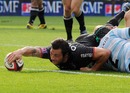 Former All Blacks scrum-half Byron Kelleher stretches for the line against Racing Metro