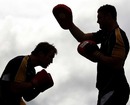 Rocky Elsom and Scott Higginbotham perform a boxing drill