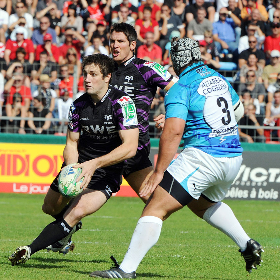 Andrew Bishop looks to offload and launch an Ospreys attack