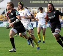 Saracens wing David Strettle runs in to score
