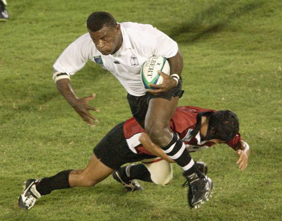 Fiji hooker Isaia Rasila breaks a tackle