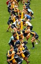 The Wallabies hit the tackle bags during training