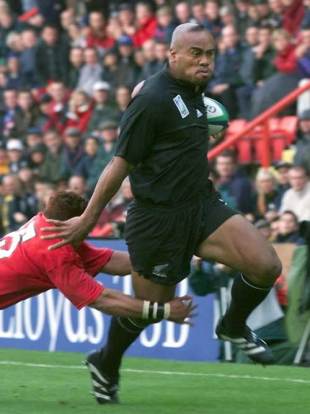A marauding Jonah Lomu breaks a Tongan tackle to score, New Zealand v Tonga, World Cup, Ashton Gate, October 3 1999
