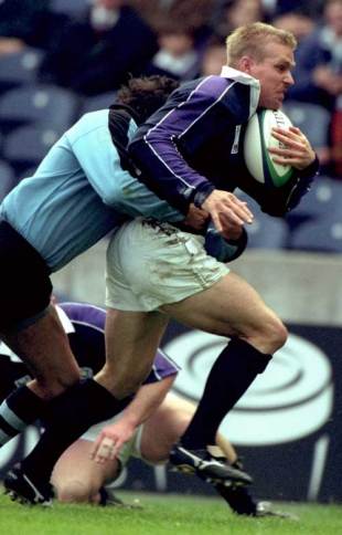 Scotland's Glenn Metcalfe struggles with the Uruguay defence, Scotland v Uruguay, World Cup, Murrayfield, October 8 1999