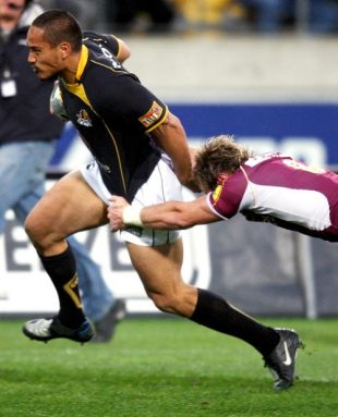 Hosea Gear of the Lions is tackled by Jimmy Cowan of Southland as he scores a try during the Air New Zealand Cup Semi Final match between Wellington and Southland at Westpac Stadium in Wellington, New Zealand  on October 17, 2008. 
