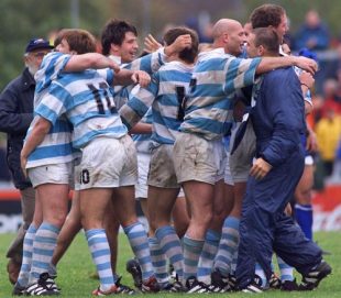 Argentinian players celebrate their victory at the end of the Rugby World Cup first-round match against Samoa, at Stradey Park in Llanelli on October 10, 1999 . 