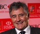 Lions tour manager Andy Irvine smiles for the cameras