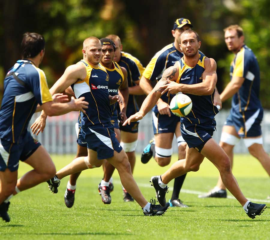 Australia fly-half Quade Cooper fires a pass during training
