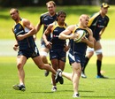 Australia wing Drew Mitchell carries the ball during training