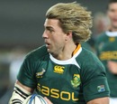 South Africa's Wynand Olivier runs with the ball