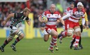 Scott Lawson charges through a gap in the Quins defence