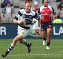 Auckland's Gareth Anscombe runs in a try