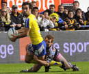 Morgan Parra looks for support after being snared in a tackle