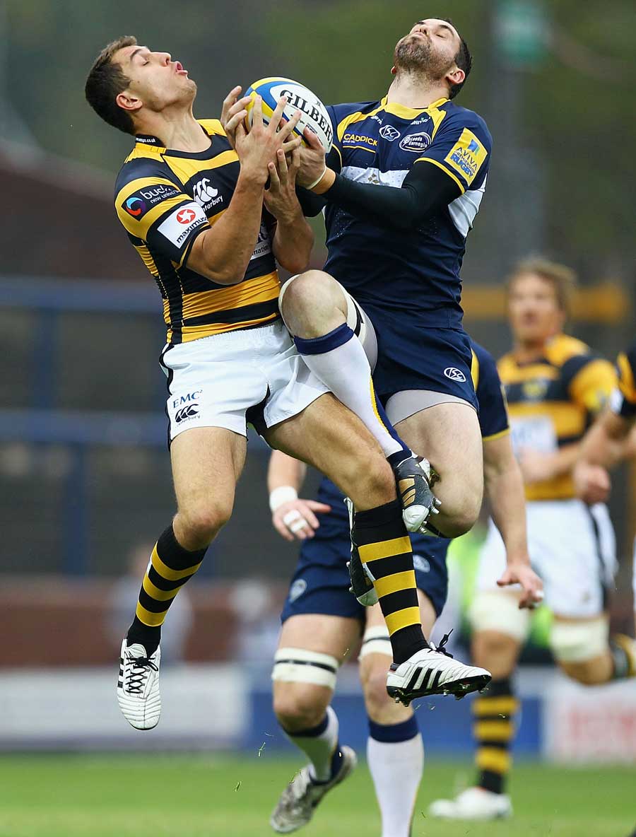Leeds fly-half Lachlan Mackay challenges Wasps' Jack Wallace for a high ball