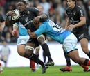 Toulouse's Yannick Nyanga stretches the Toulon defence
