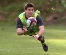 England's Ben Youngs gets the ball moving in training