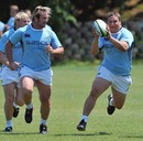 South Africa's Coenie Oosthuizen and Jannie du Plessis run a drill