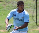 South Africa's Elton Jantjies on the run in training