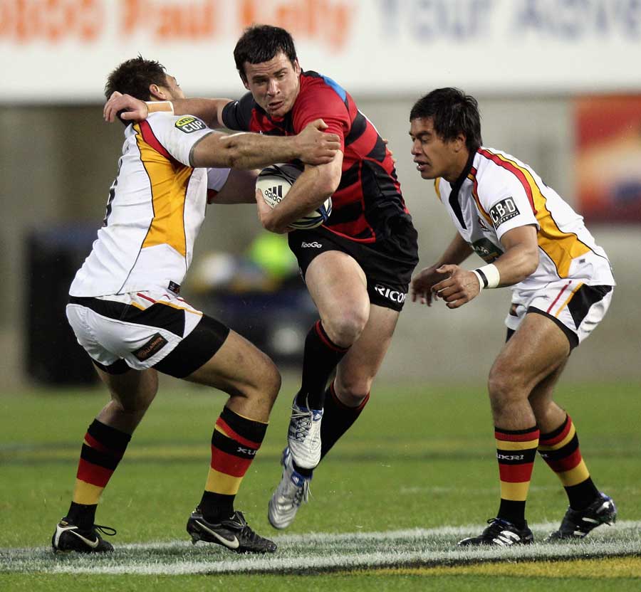 Canterbury's Ryan Crotty takes on the Waikato defence