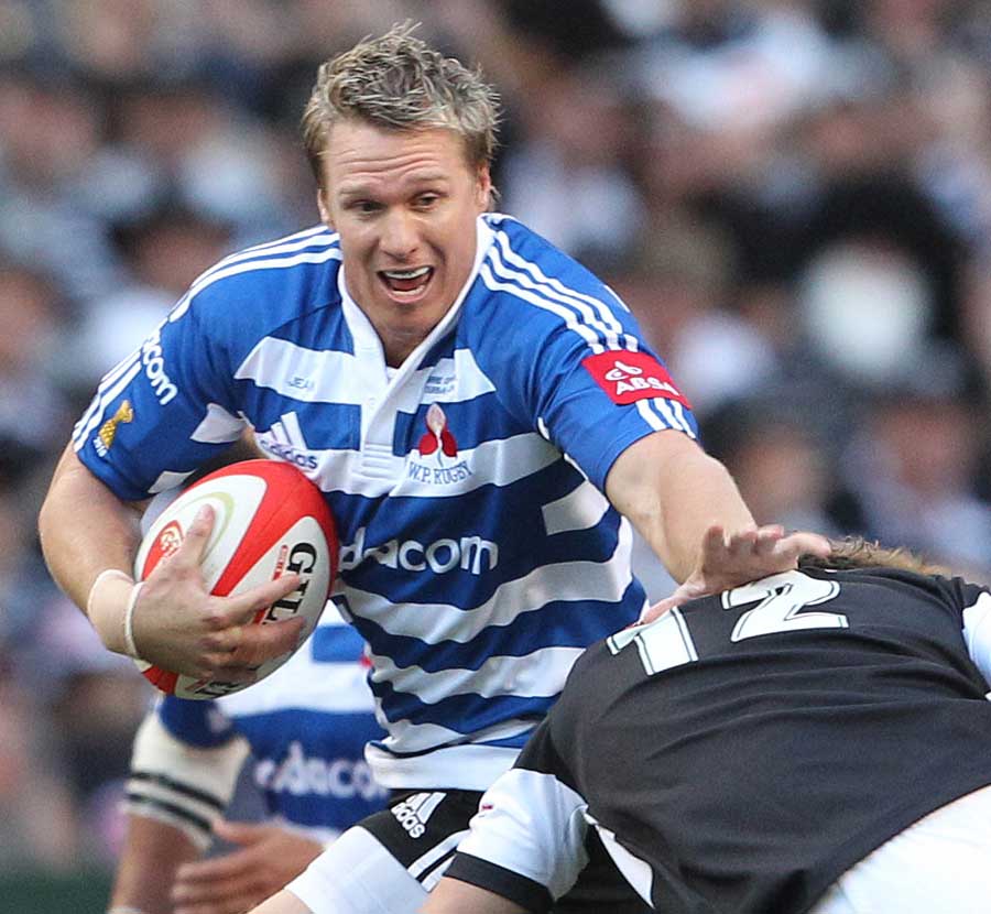 Western Province centre Jean de Villiers takes on the Sharks defence