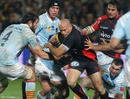 Toulon fly-half Felipe Contepomi takes on the Perpignan defence