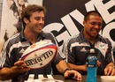 Conrad Smith and Kevan Mealamu enjoy a signing session