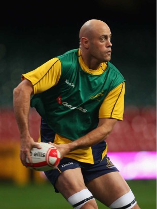 Australia's Nathan Sharpe passes the ball during training, Captain's Run, Millennium Stadium, Cardiff, Wales, November 5, 2010