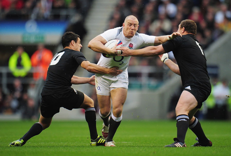 England's Mike Tindall tries to break through the All Blacks defence