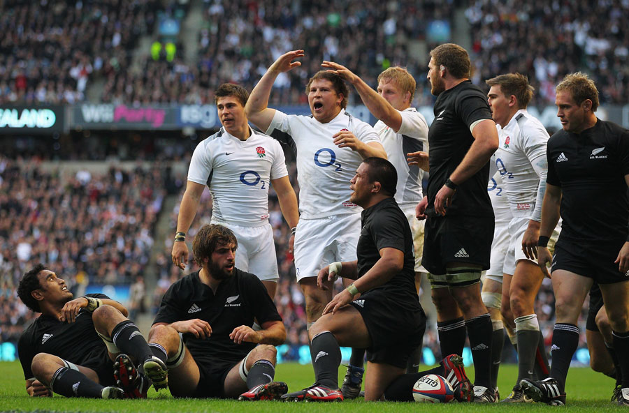 England hooker Dylan Hartley celebrates his try