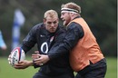 James Haskell is confronted by Dan Cole during training