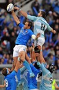 Italy's Sergio Parisse and Argentina's Juan Martin Fernandez Lobbe vie for a lineout ball