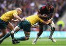 England's Courtney Lawes takes on the Wallaby defence
