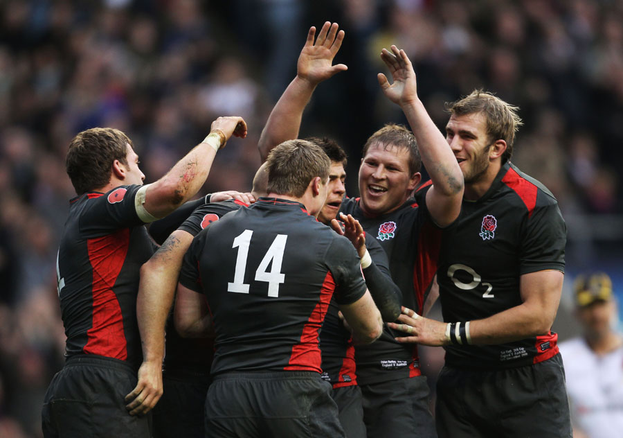 England's players celebrate after Chris Ashton's try
