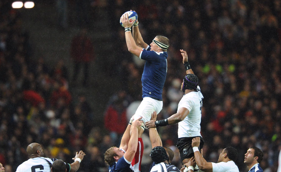 France No.8 Imanol Harinordoquy claims a lineout