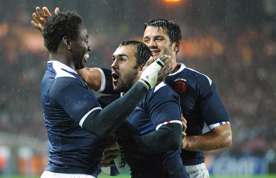 France centre David Marty is congratulated after his try