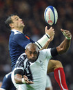 France fly-half Damien Traille claims a high ball